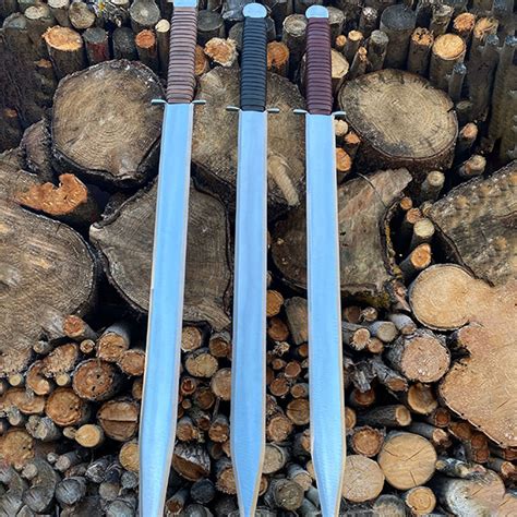 Its meticulously crafted from 1012 carbon steel, renowned for its strength and resilience. . Viking wood splitter sword
